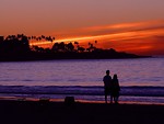Free Stock Photo: A couple on the beach during sunset.