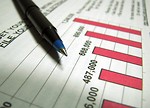 Free Stock Photo: Closeup of a tax income graph and pen