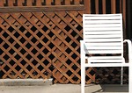 Free Stock Photo: White chair by fence