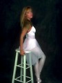 Free Stock Photo: A ballerina in pink posing on a stool