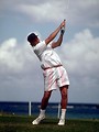 Free Stock Photo: A man swinging a golf club near the ocean