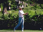 Free Stock Photo: An older man swinging a golf club