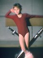 Free Stock Photo: A young girl posing against a pommel horse