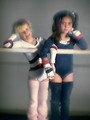 Free Stock Photo: Two young girls posing against a balance beam