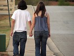 Free Stock Photo: Teen boy and girl holding hands