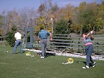 Free Stock Photo: Golfers at a golf driving range
