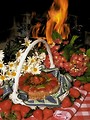 Free Stock Photo: Fruit dessert and flowers and a fire