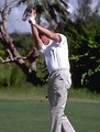 Free Stock Photo: A man swinging a golf club.