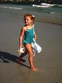 Free Stock Photo: A young girl walking on the beach