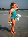 Free Stock Photo: A young girl walking on the beach
