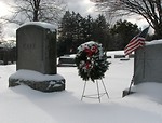 Free Stock Photo: Tombstones with a flag and wreath