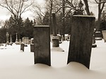 Free Stock Photo: Black and white old tombstones in a snow covered graveyard