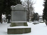 Free Stock Photo: A blank tombstone in a snow covered graveyard