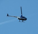 Free Stock Photo: A small blue helicopter in the sky