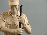 Free Stock Photo: Closeup of a statue of a man working on train tracks