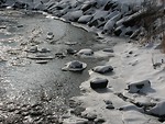 Free Stock Photo: Snow and ice on the edge of a stream