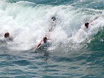 Free Stock Photo: Men swimming in the ocean