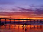 Free Stock Photo: A pier over the ocean at sunset