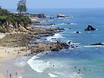 Free Stock Photo: People swimming in the ocean by the beach