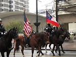 Free Stock Photo: Mounted police officers with flags at the 2009 Atlanta Saint Patricks Day Parade