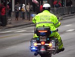 Free Stock Photo: An Atlanta police officer on a motorcycle at the 2009 Atlanta Saint Patricks Day Parade
