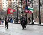 Free Stock Photo: Police officers marching with flags in the 2009 Atlanta Saint Patricks Day Parade
