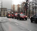 Free Stock Photo: A firetruck and rescue vehicles in the 2009 Atlanta Saint Patricks Day Parade