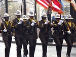 Free Stock Photo: Police officers marching with flags in the 2009 Atlanta Saint Patricks Day Parade