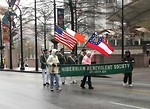 Free Stock Photo: People marching with flags in the 2009 Atlanta Saint Patricks Day Parade.