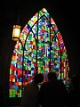 Free Stock Photo: A couple standing in front of a stained glass window