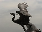 Free Stock Photo: Statue of a bird overlooking water