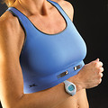Free Stock Photo: Closeup of an older woman wearing a blue sports bra and watch