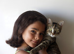 Free Stock Photo: Closeup of a young girl holding a cat