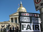Free Stock Photo: A protest sign in front of the State Capitol building at the 2009 tax day tea party in Atlanta, Georgia