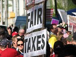 Free Stock Photo: Protest flags and signs at the 2009 tax day tea party in Atlanta, Georgia