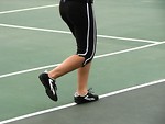 Free Stock Photo: Closeup of a girls legs running on a tennis court