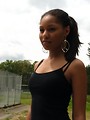 Free Stock Photo: A beautiful African American teen girl on an athletic field