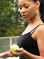 Free Stock Photo: A beautiful African American teen girl holding a tennis ball