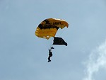 Free Stock Photo: A member of the US Army Golden Knights parachuting at the 2009 Robins AFB Air Show.