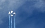 Free Stock Photo: F-16 Air Force Thunderbird jets flying in formation at the 2009 Robins AFB Air Show.