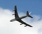 Free Stock Photo: A large military plane flying in the sky at the 2009 Robins AFB Air Show