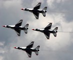 Free Stock Photo: F-16 Air Force Thunderbird jets flying in formation at the 2009 Robins AFB Air Show.