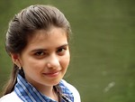 Free Stock Photo: Close-up portrait of a young girl by a lake
