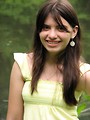 Free Stock Photo: Close-up portrait of a beautiful young girl by a lake