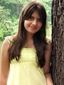 Free Stock Photo: Close-up of a beautiful young girl posing by a lake
