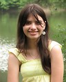 Free Stock Photo: Portrait of a beautiful young girl by a lake