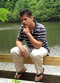 Free Stock Photo: A young latino man posing outdoors by a lake