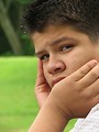 Free Stock Photo: Close-up of a  teen latino boy looking worried