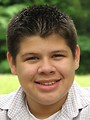 Free Stock Photo: Close-up of a teen latino boy posing outdoors.