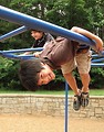 Free Stock Photo: Two young latino boys playing on a playground
